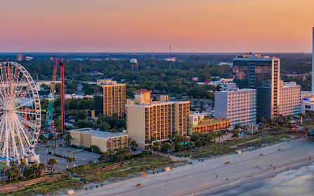 A city with a ferris wheel.