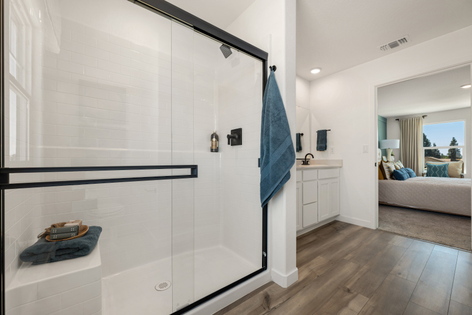 A bathroom with a glass shower.