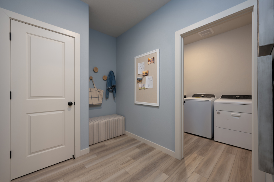 A room with white cabinets.