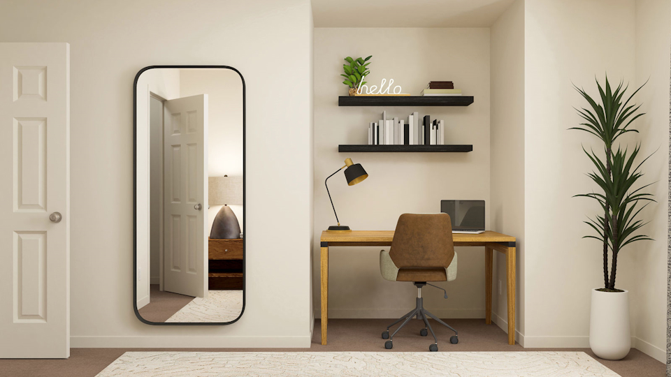 A room with a desk and a chair.