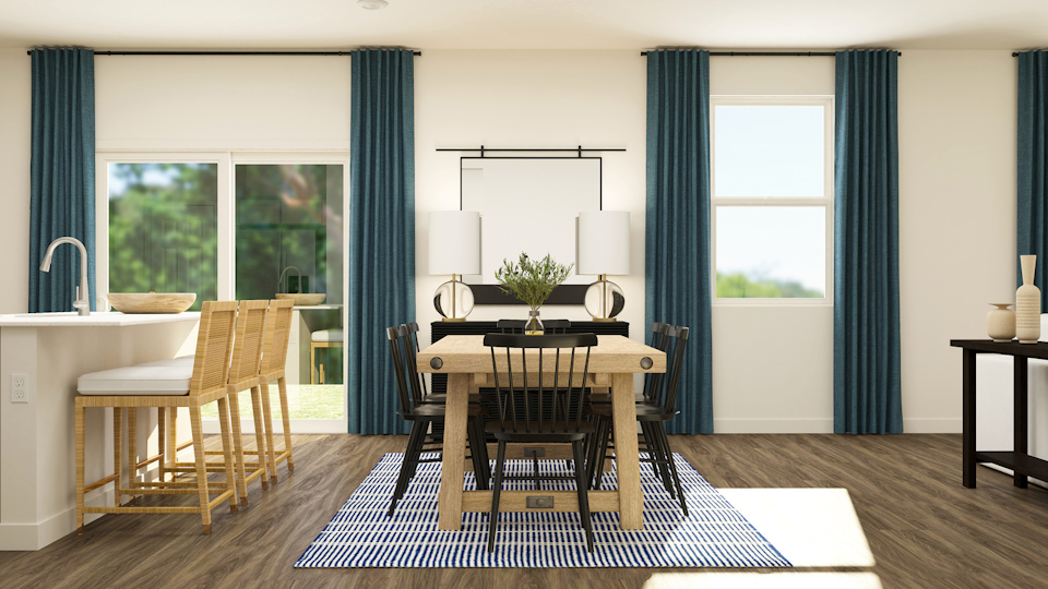 A room with a table and chairs.