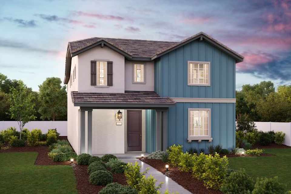 A house with a large front yard.