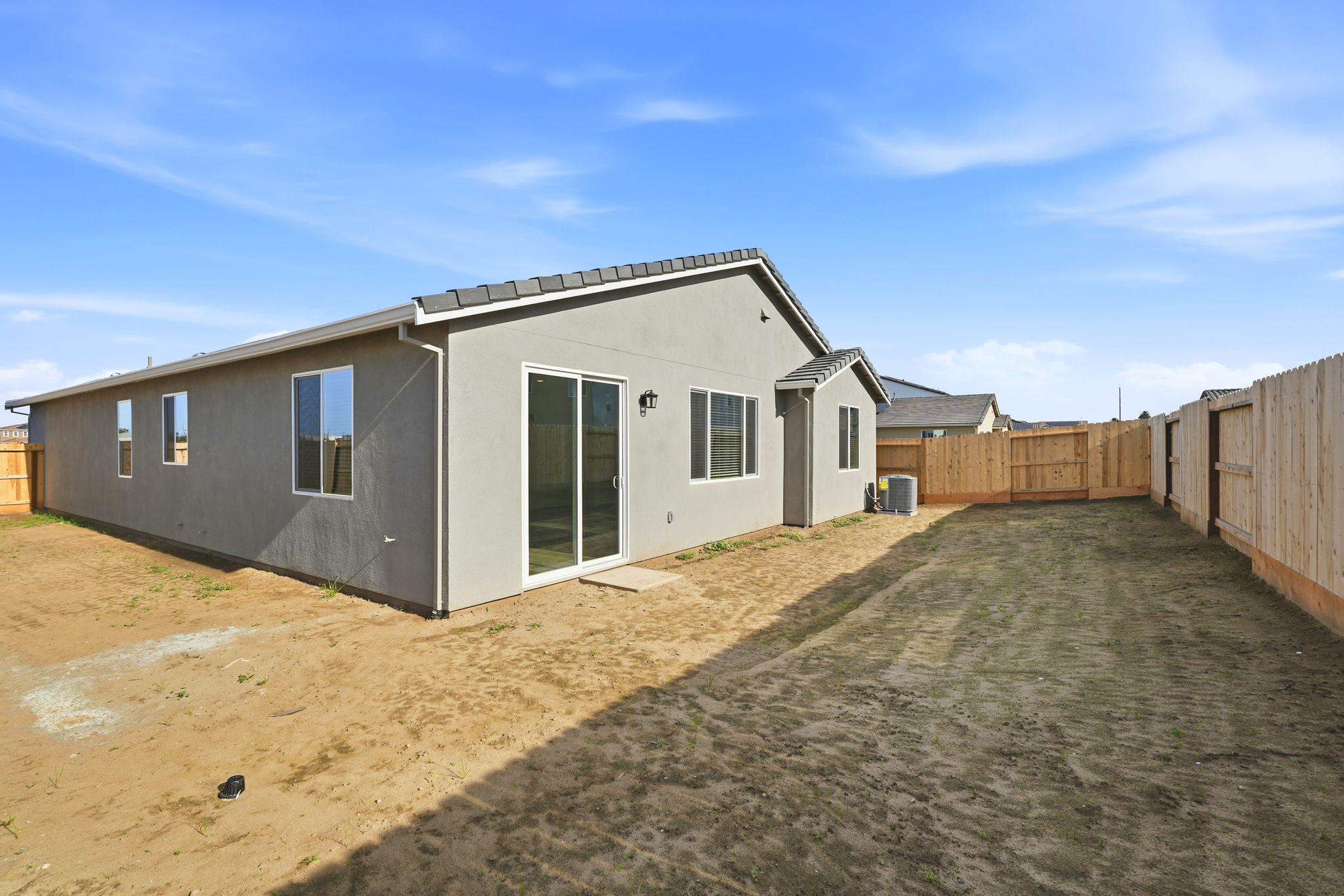 A house with a fence around it.