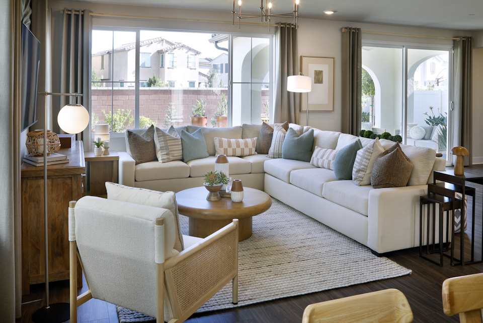 A living room with a large window.