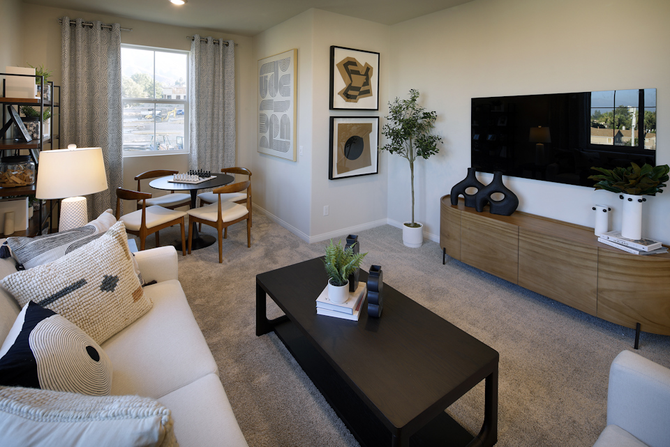 A living room with a couch and a coffee table.