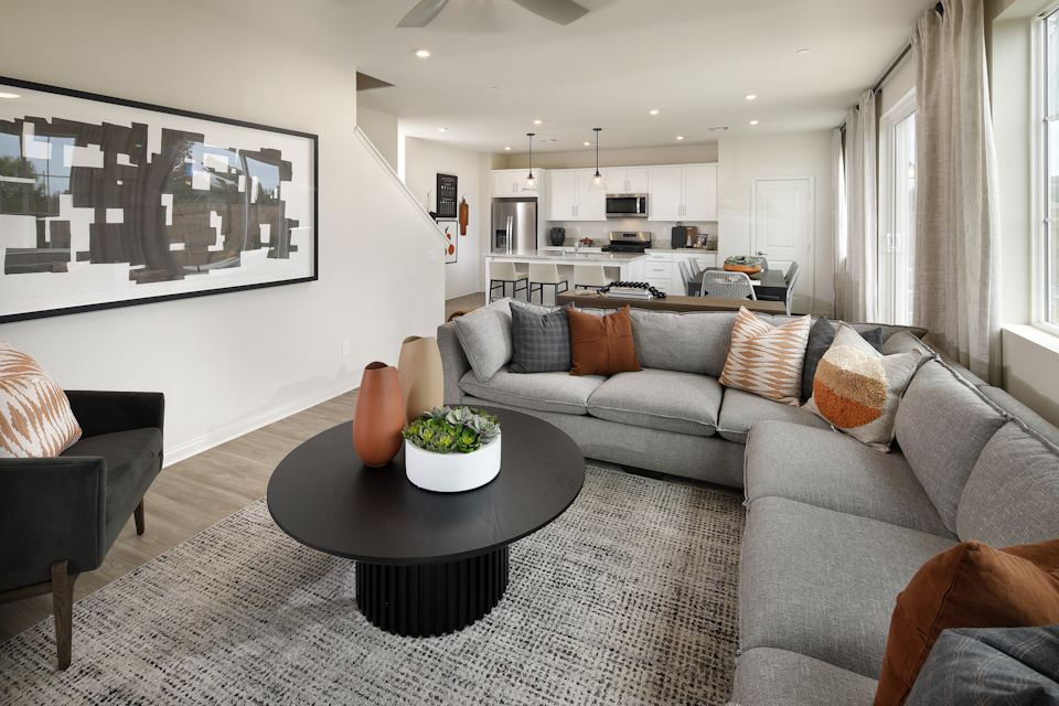 A living room with a couch and a coffee table.
