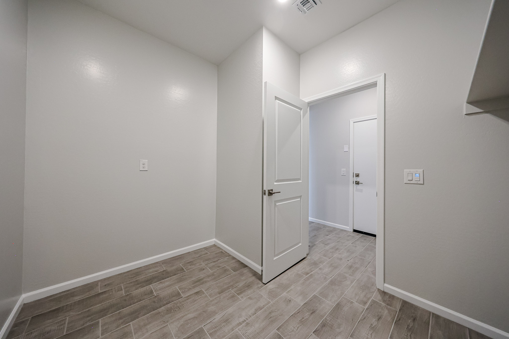 A room with white doors.