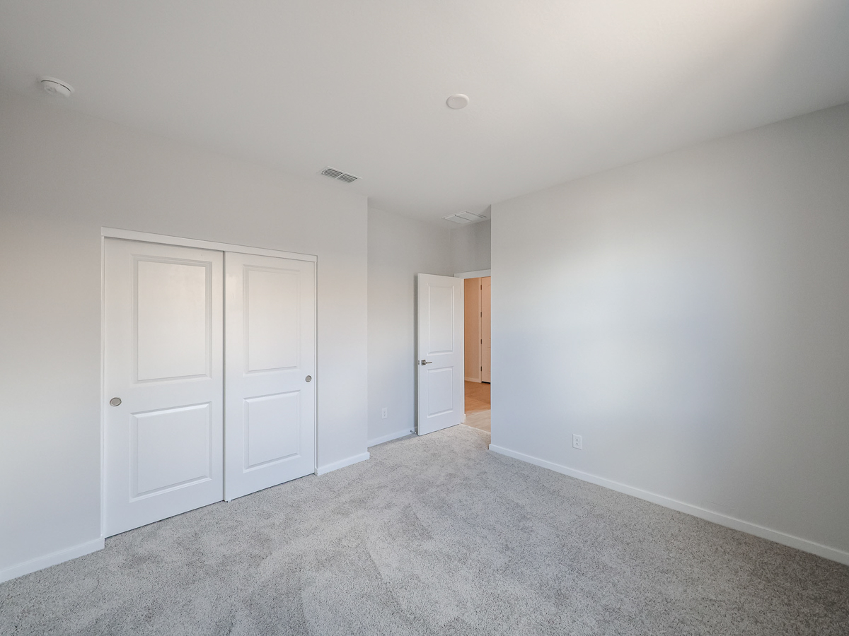 A room with white doors.