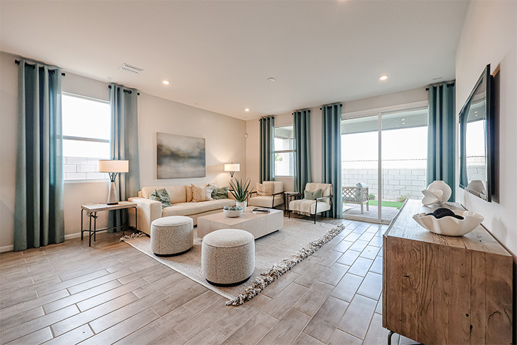 A large living room with a large window.