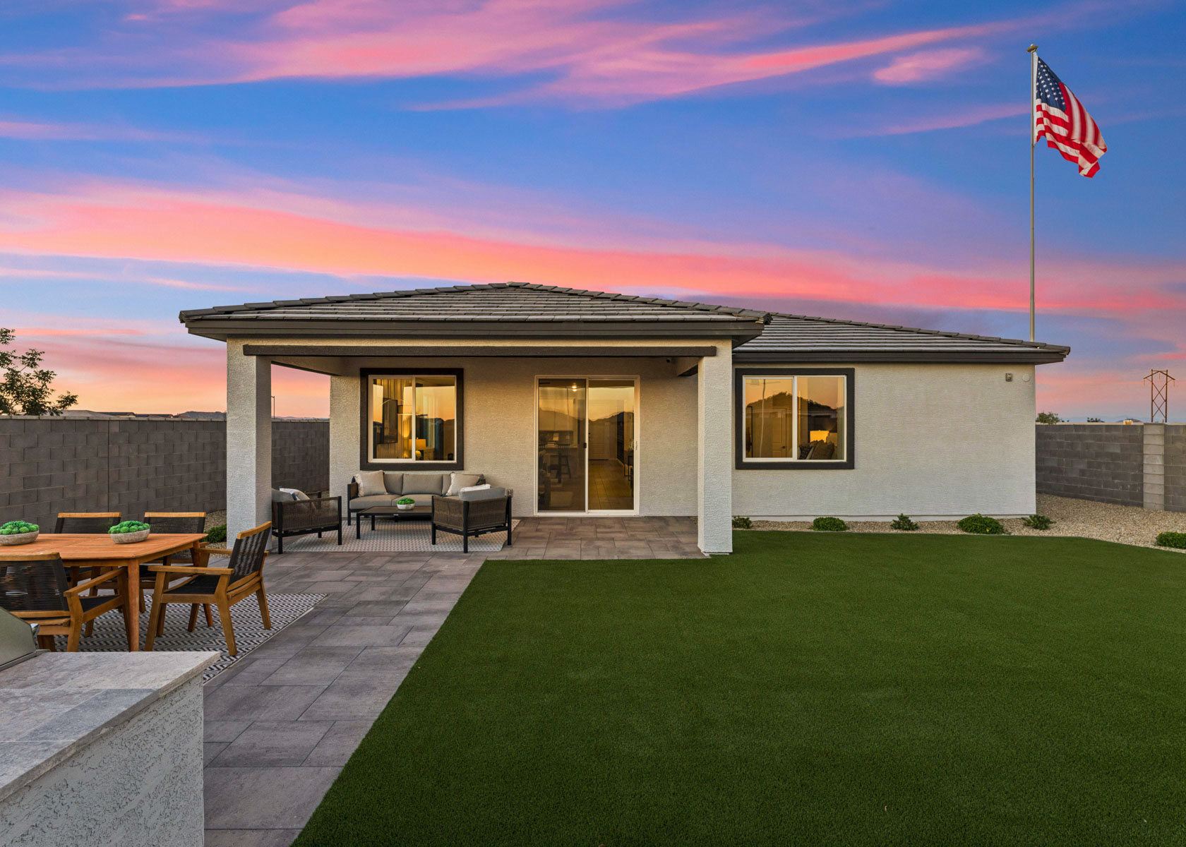 A house with a flag on the roof.