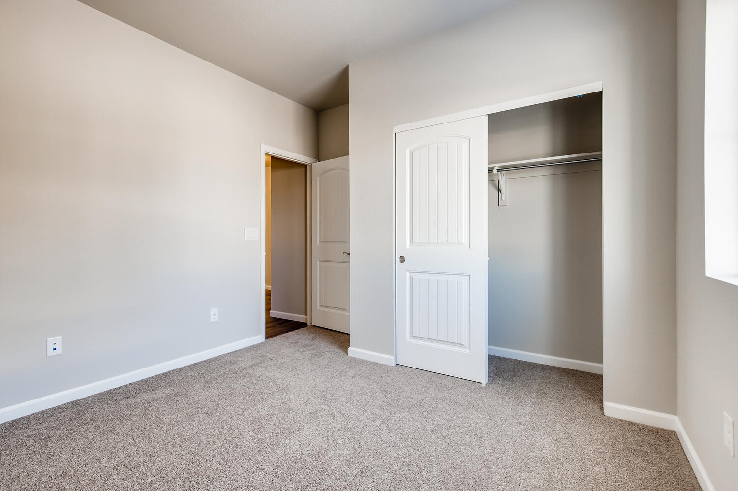 A room with white doors.