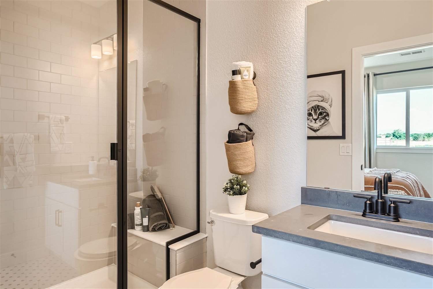 A bathroom with a glass shower.