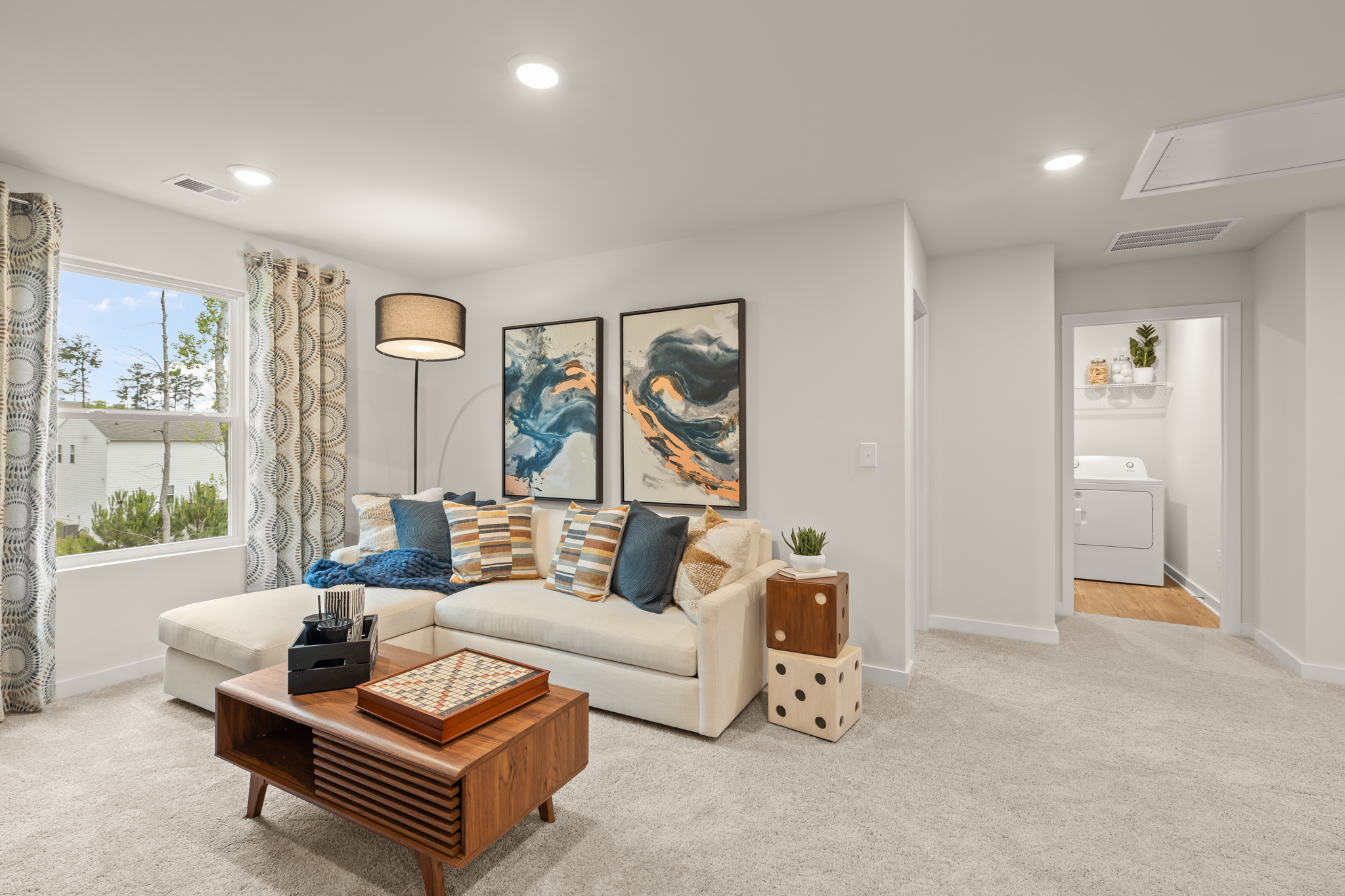 A living room with a couch and a coffee table.