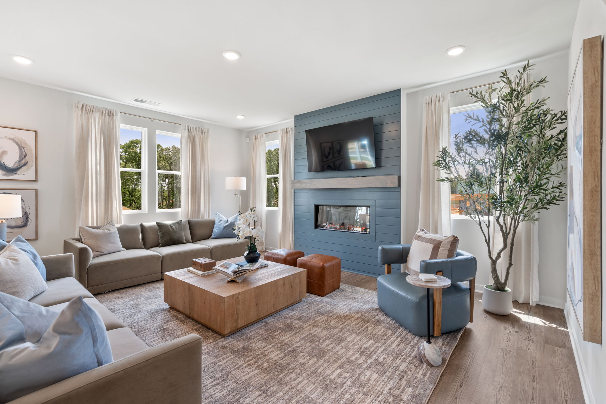 A living room with a fireplace.