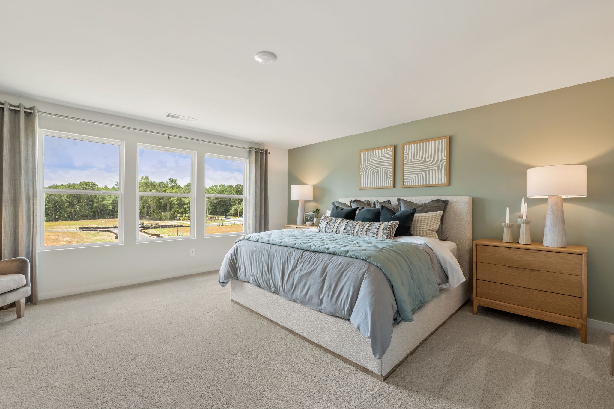 A bedroom with a large bed.