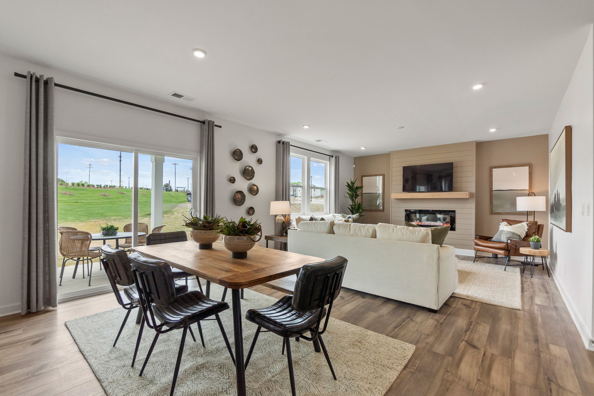 A living room with a large window.