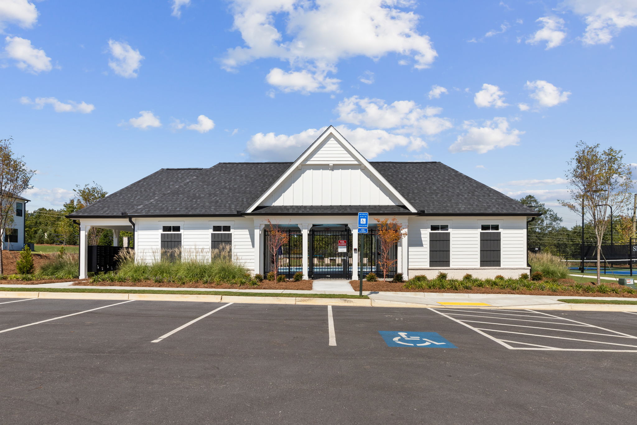 A building with a parking lot.