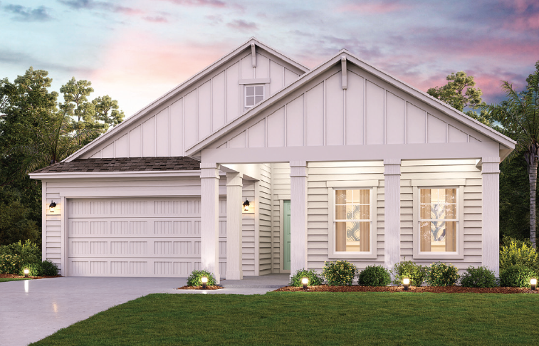 A white house with a lawn.