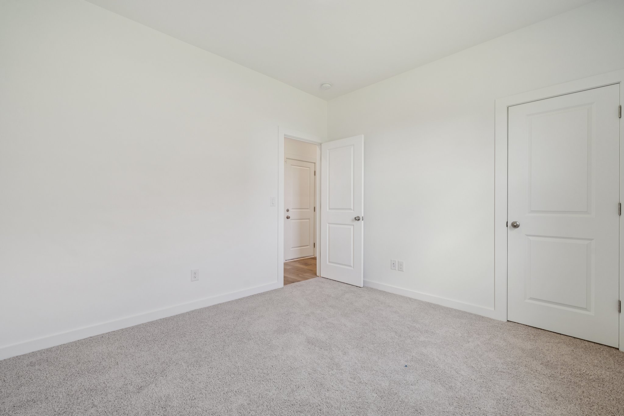 A room with white doors.