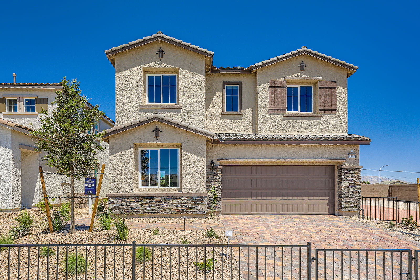 A house with a fence around it.