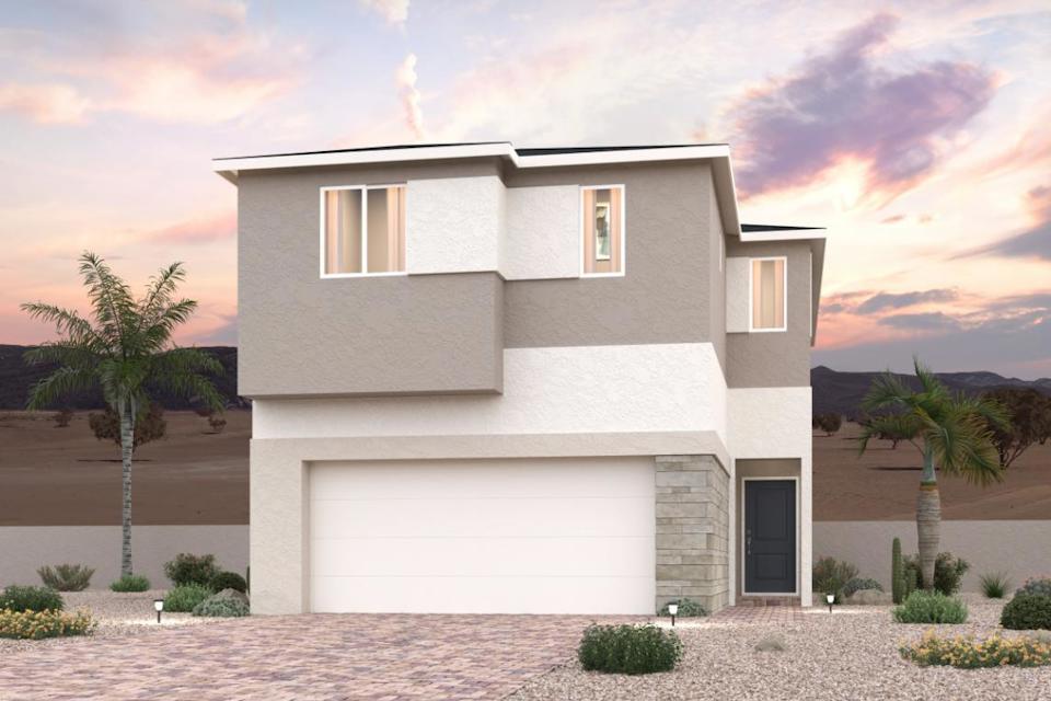 A white house with palm trees.