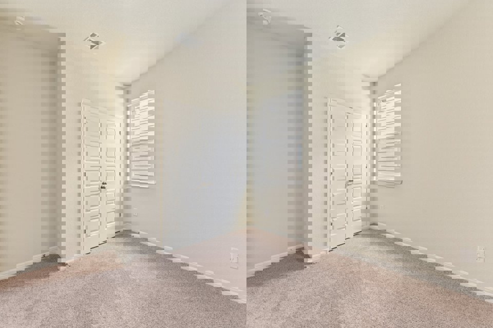 A room with white doors.