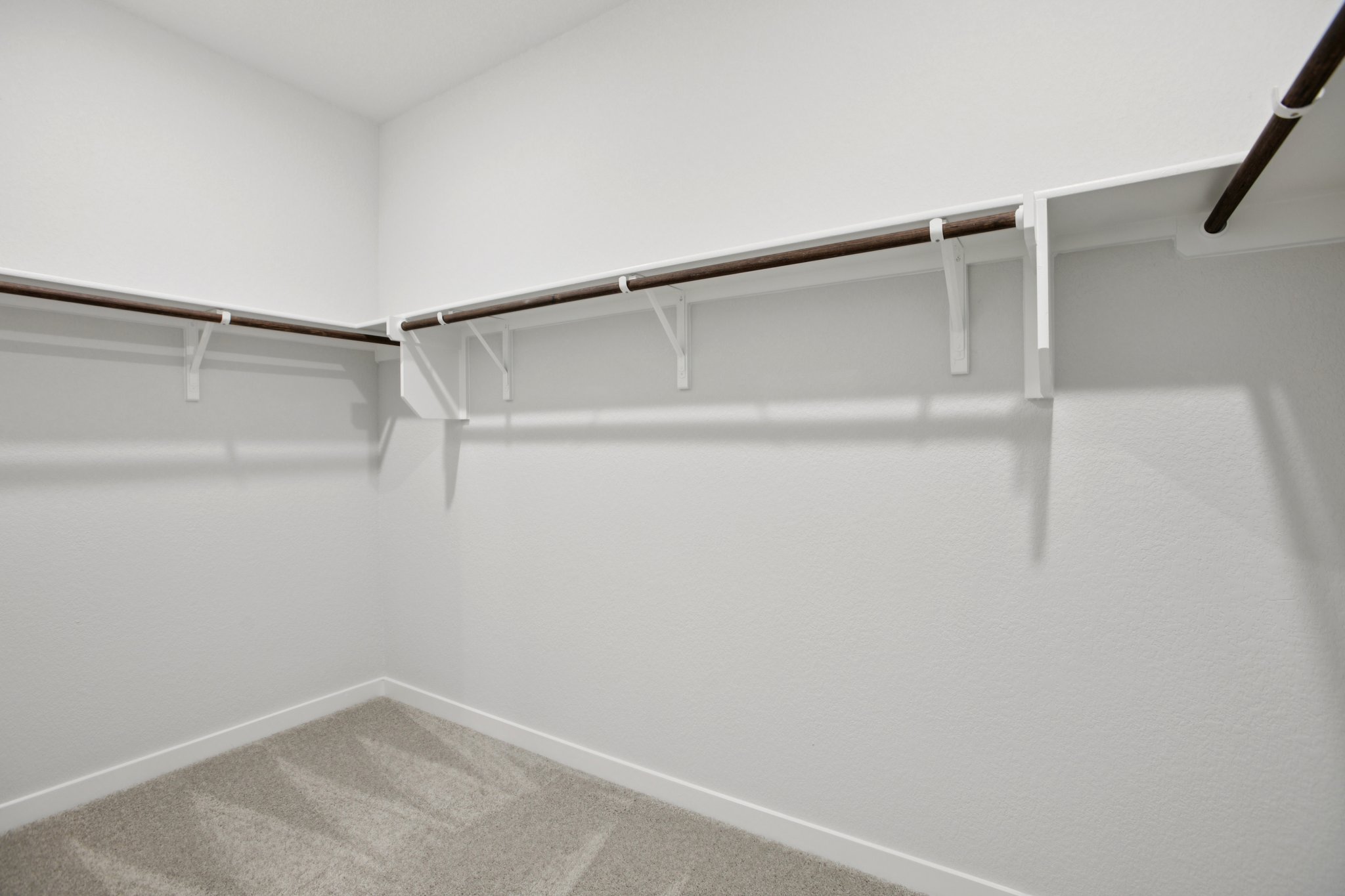 A white staircase in a room.