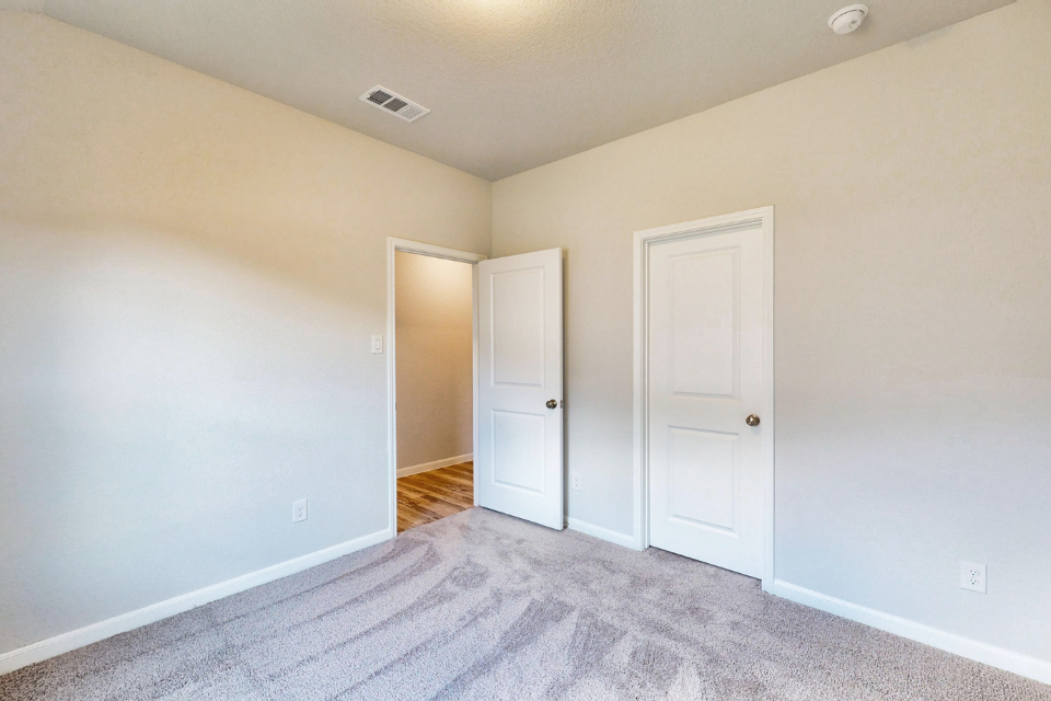 A room with white doors.