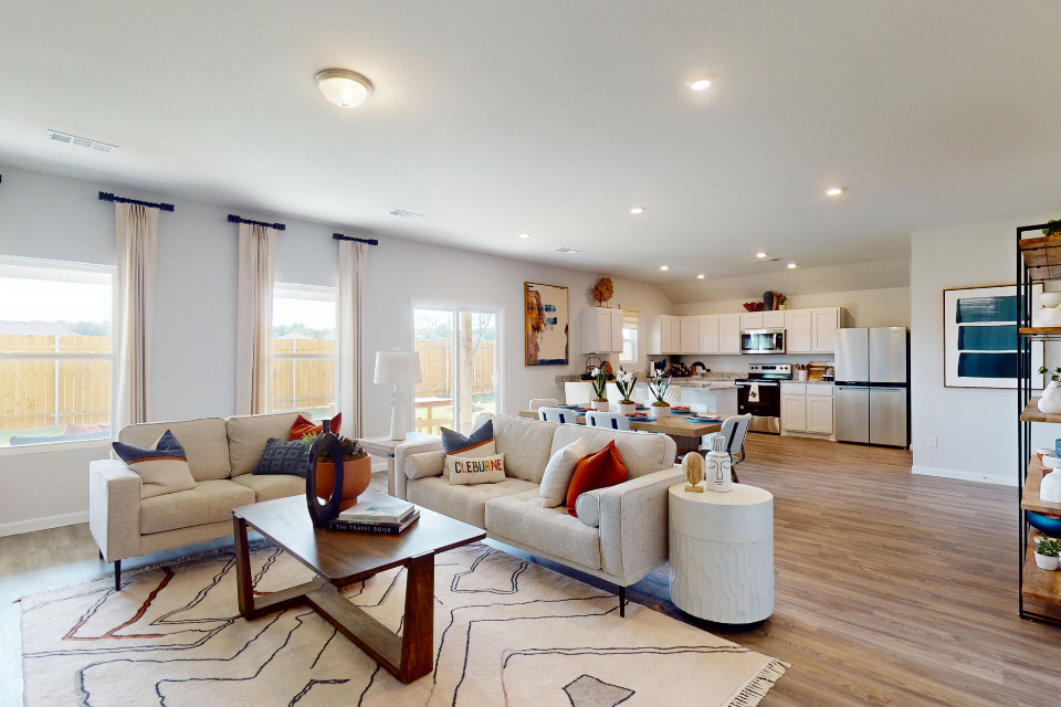A living room with a large window.