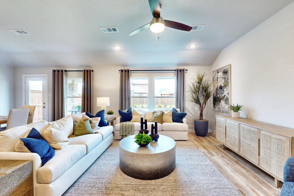 A living room with a large window.