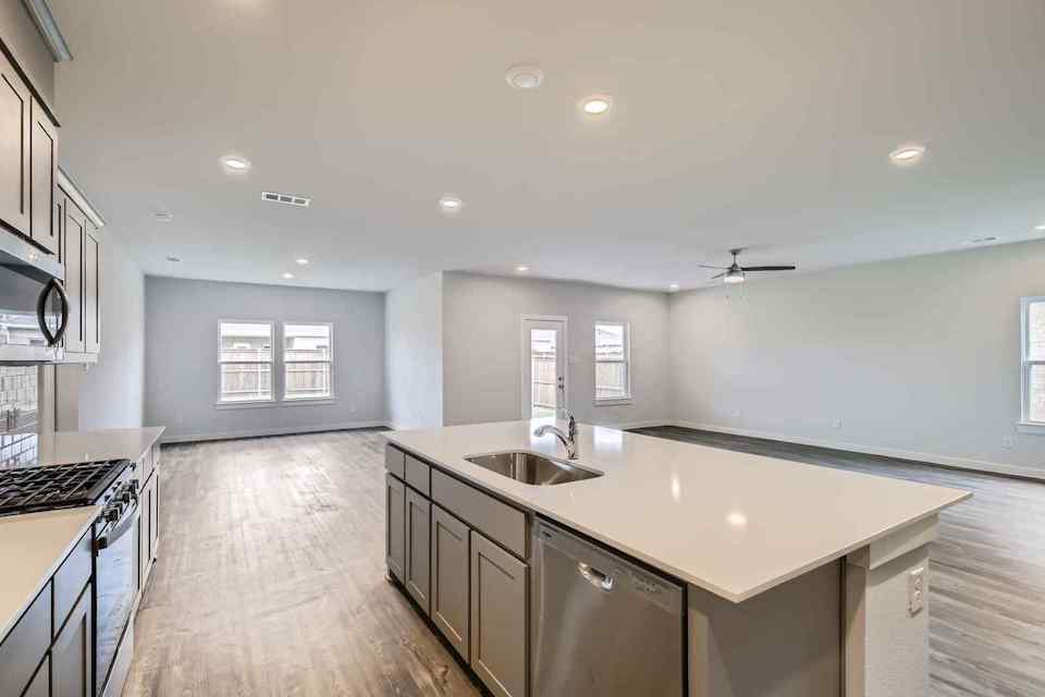 A kitchen with a large island.