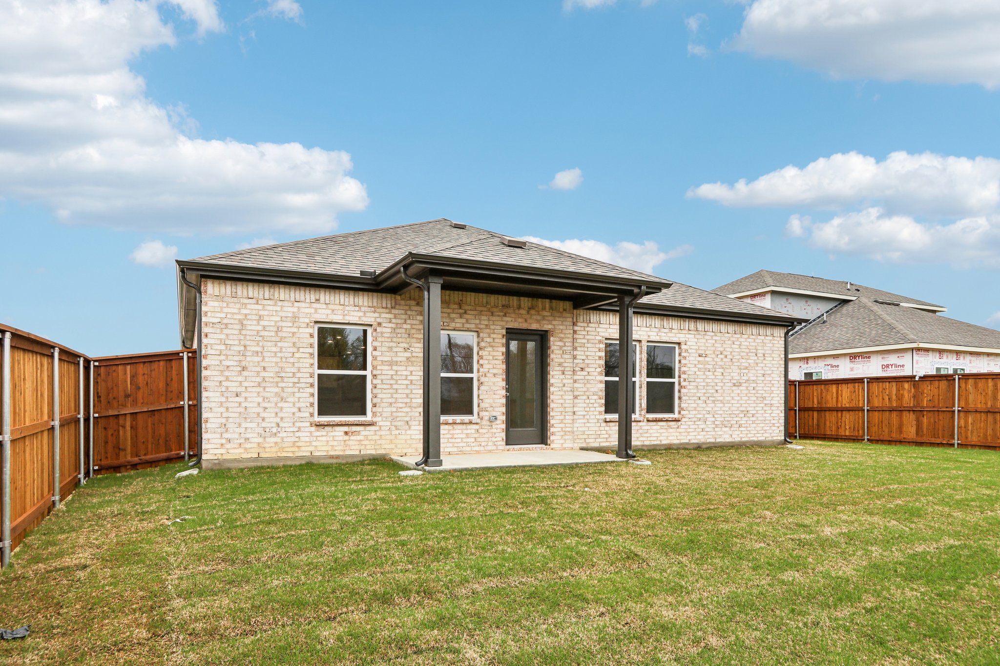 A house with a fence around it.