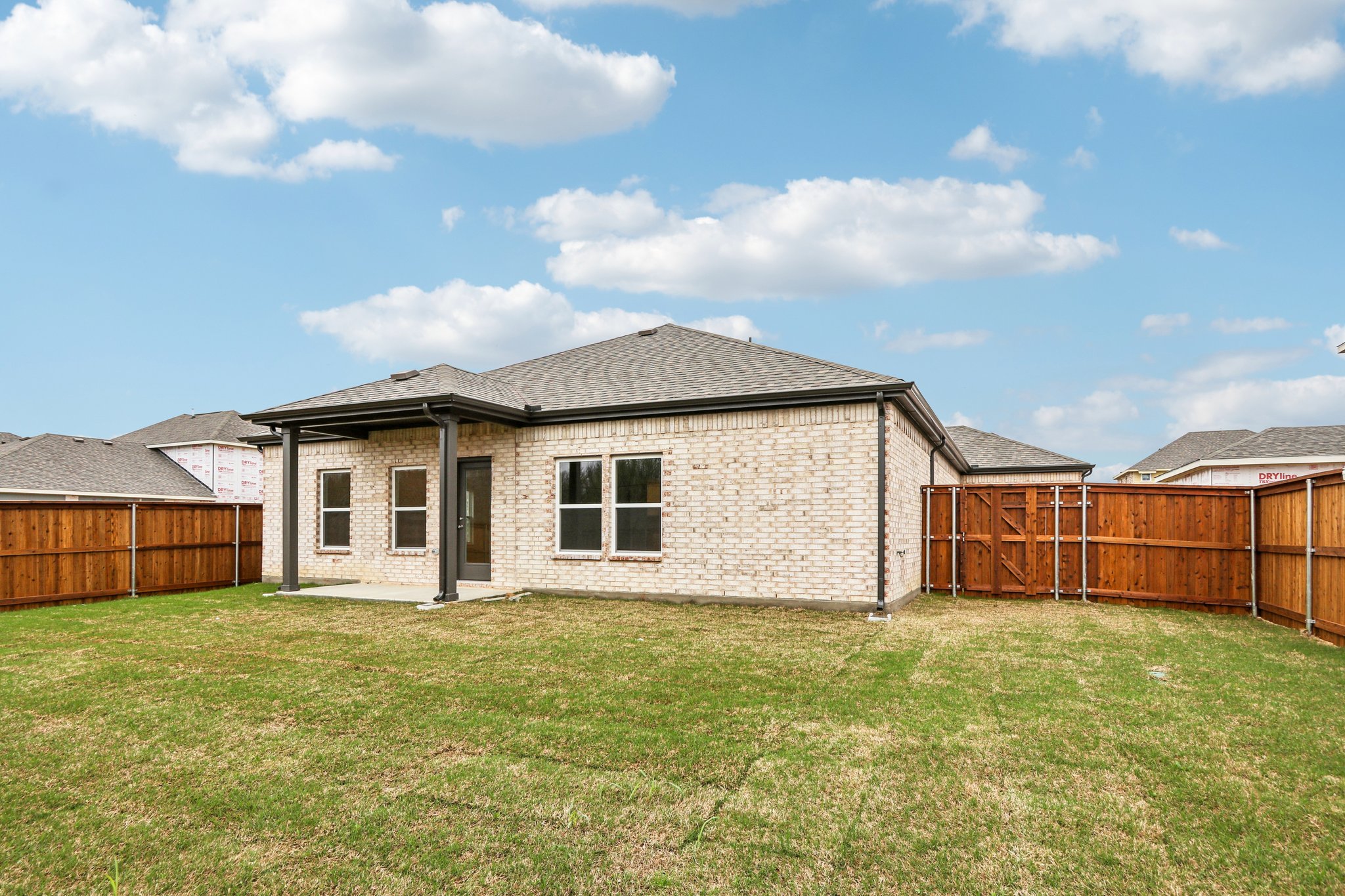 A house with a fence around it.
