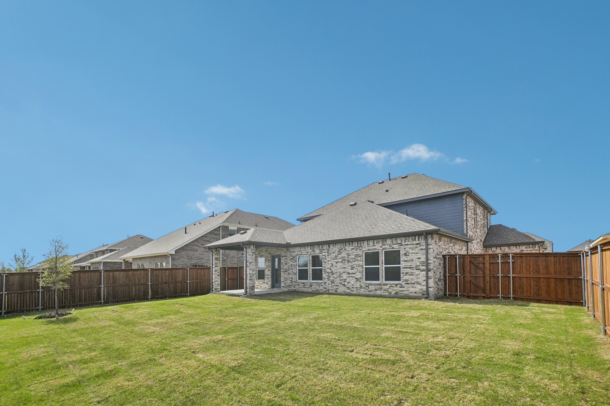 A house with a fence around it.