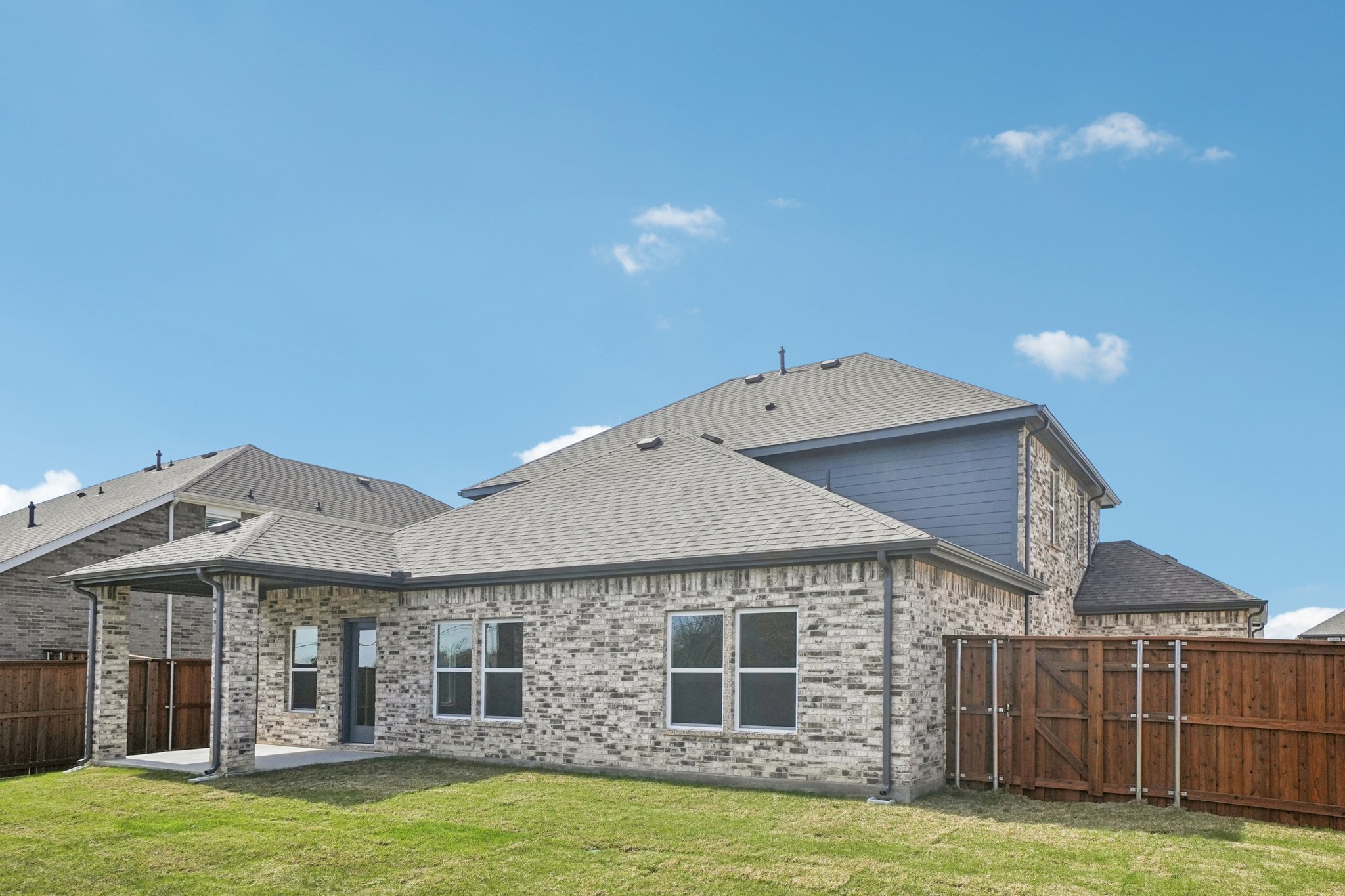 A house with a fence around it.