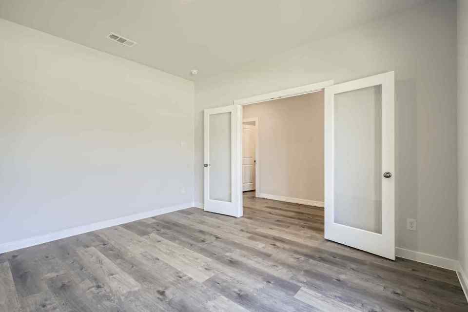 A room with white doors.