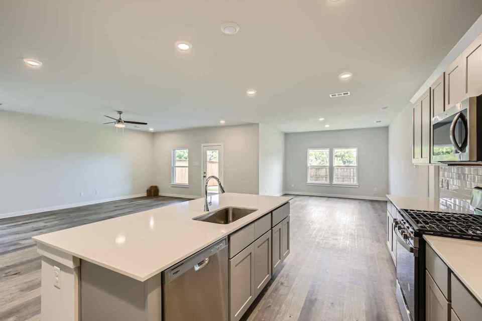 A kitchen with a large island.