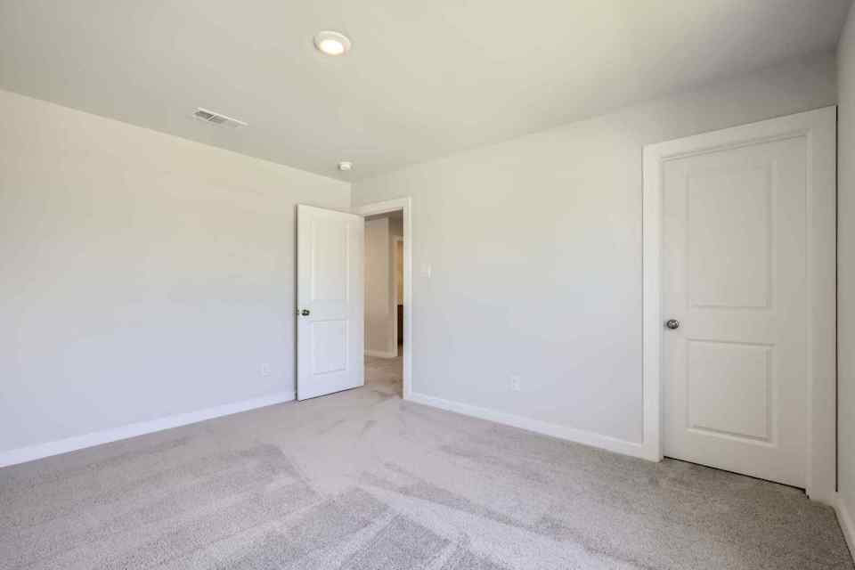 A room with white doors.