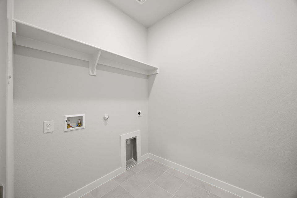 A white room with a white wall.