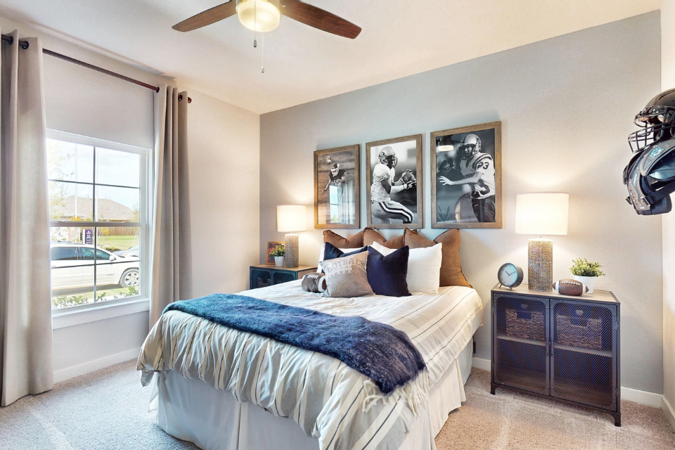 A bedroom with a large bed.