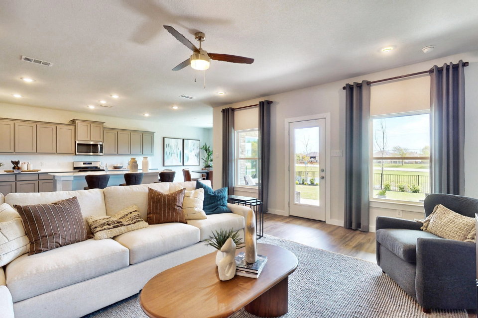 A living room with a large window.