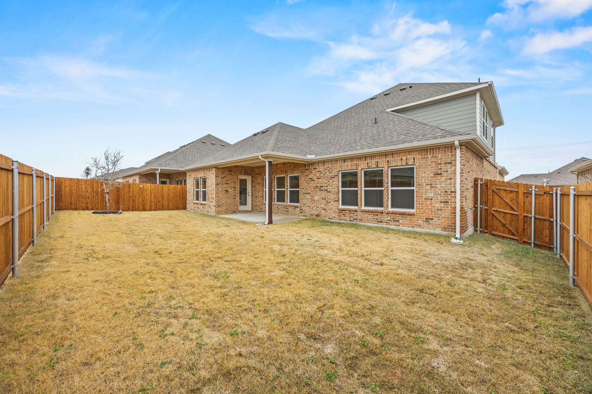 A house with a fence around it.