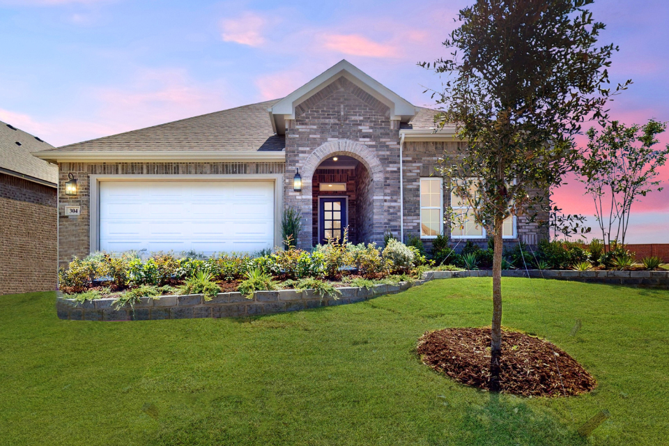 A house with a large front yard.