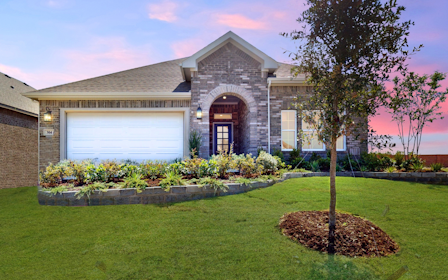 A house with a large front yard.