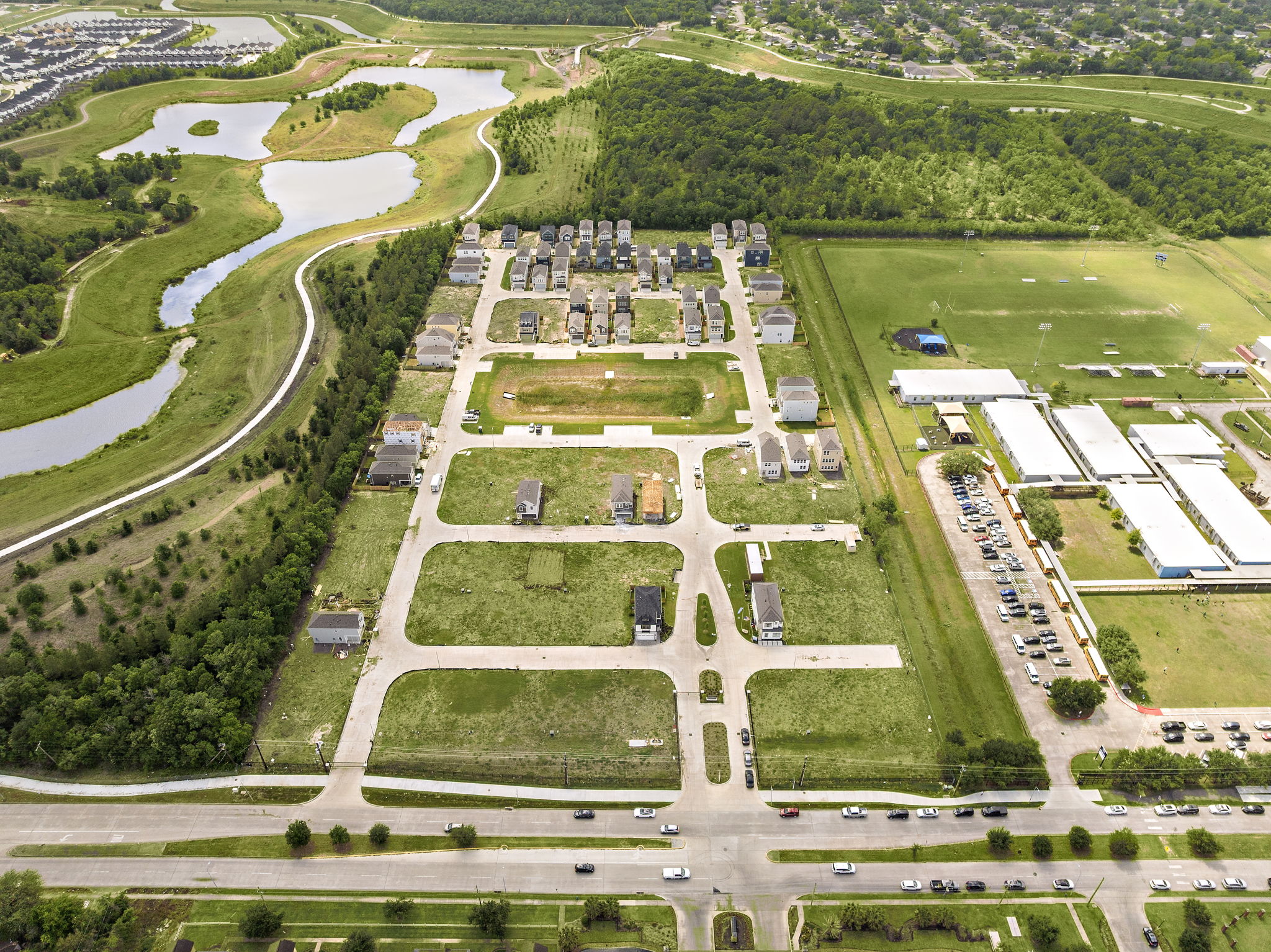 Aerial view of a large area with Vaux-le-Vicomte in the background.