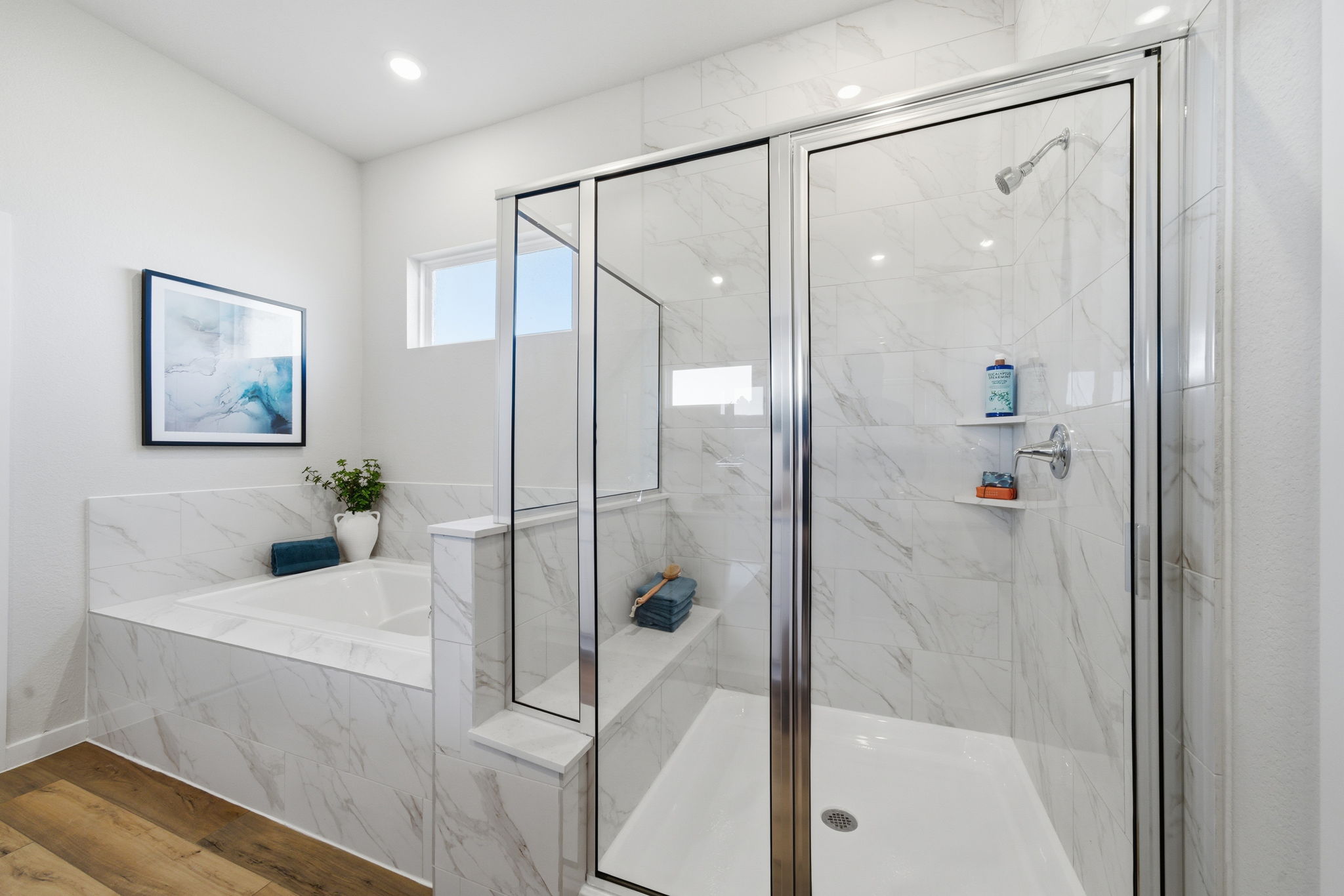 A bathroom with a glass shower.