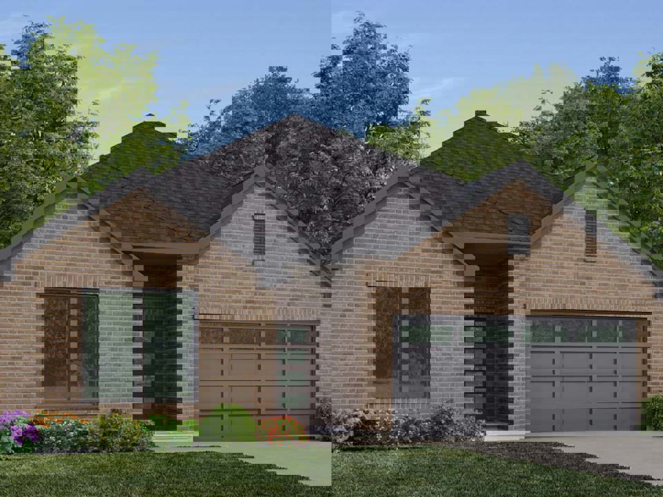 A brick house with a driveway.