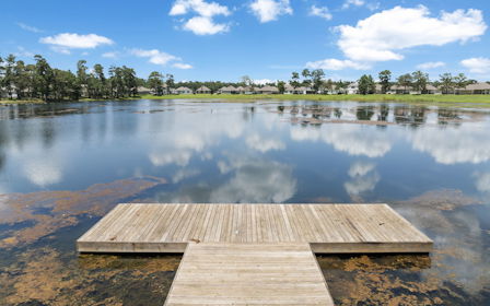 A wooden dock over a body of water.