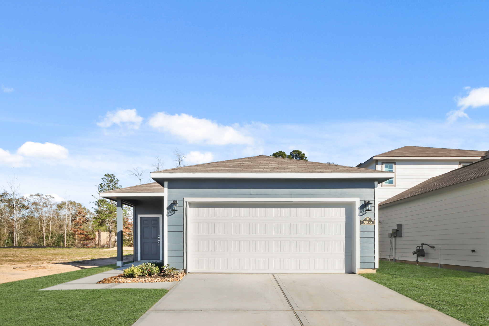 A building with garages and a driveway.