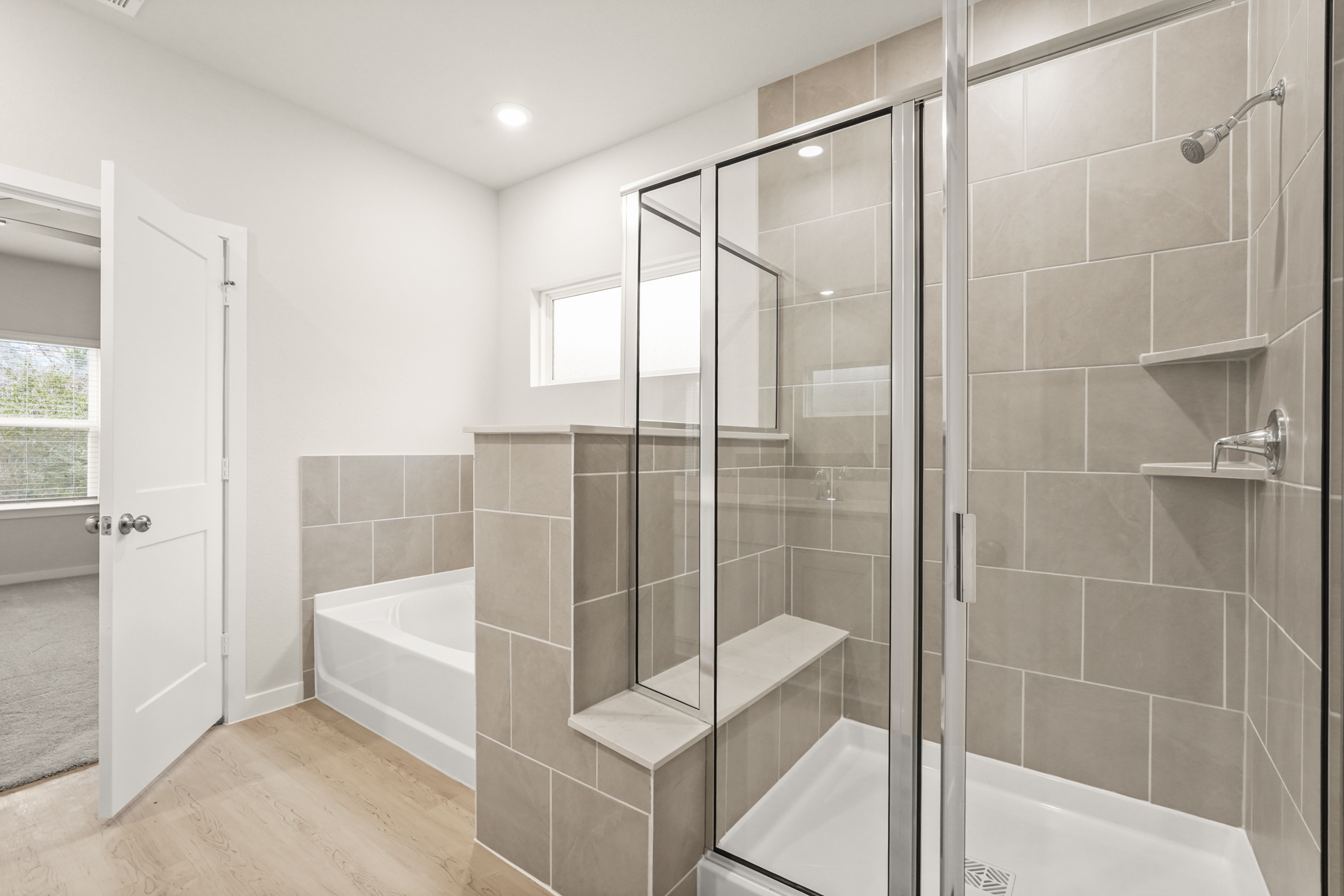 A bathroom with a glass shower.